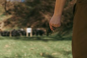 Man Holding Revolver Gun Laws